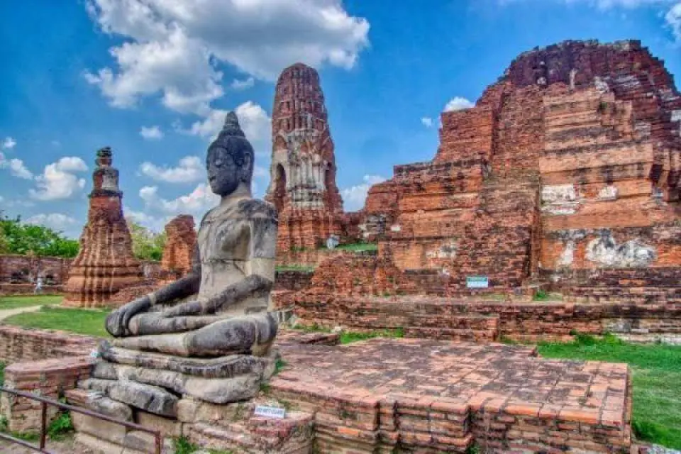 Wat Mahathat – Famous for the Buddha head entwined in ancient tree roots.