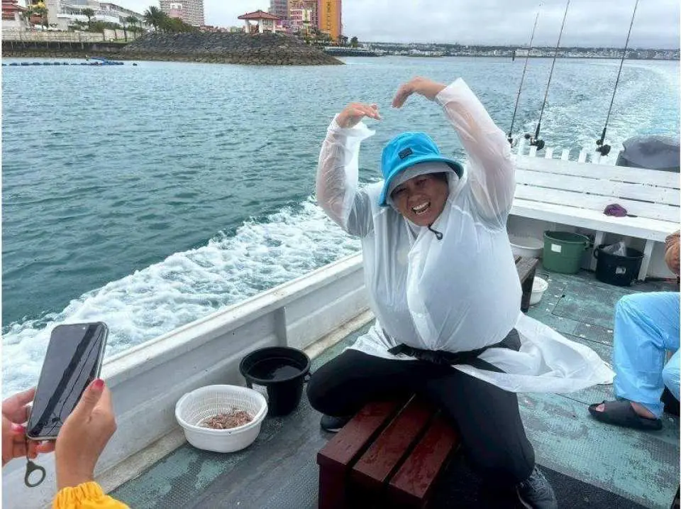 After catching a fish, they were all smiles! With American Village in the background, they headed home.