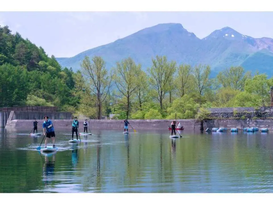 Experience #2. Once you get the hang of it, try standing up! SUP on Lake Akimoto is appealing because the wind is relatively calm, making it easy for anyone to stand up!