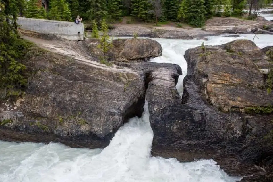 Visit Natural Bridge, a unique rock formation carved by powerful rushing waters over time.