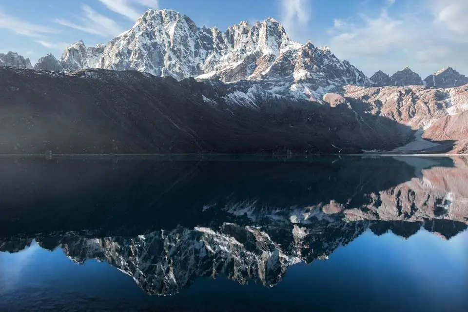 Gokyo Lake is a breathtaking series of six high-altitude glacial lakes located in Nepal’s Everest region at an elevation of around 4,700–5,000 meters. Known for their striking turquoise-blue waters, the lakes sit beneath towering Himalayan peaks and beside the massive Ngozumpa Glacier, the longest glacier in Nepal.

Considered sacred by both Hindus and Buddhists, the Gokyo Lakes hold deep spiritual significance and are part of the protected Sagarmatha National Park (UNESCO World Heritage Site). Surrounded by dramatic mountain scenery, including views of Cho Oyu, Everest, Lhotse, and Makalu, the lakes offer one of the most serene and picturesque landscapes in the Himalayas.