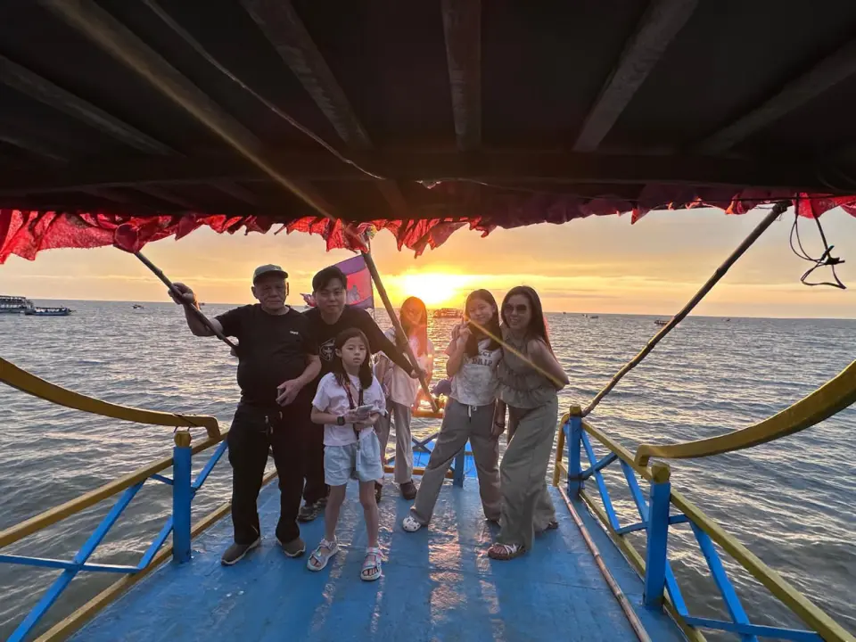 Sunset on Tonle Sap Lake : Relax on a boat cruise as the sun sets over the unique floating village.