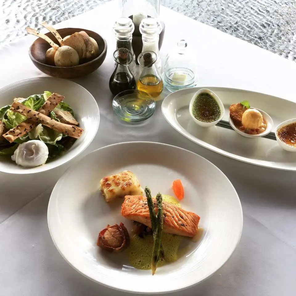 The menu showcases a blend of contemporary international cuisine and traditional Indonesian flavors, offering a selection of dishes that combine modern culinary techniques with authentic local ingredients.