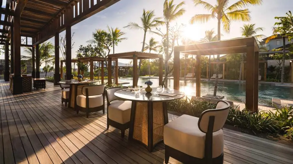 Taru Restaurant offers an all-day dining experience with a diverse selection of international favorites, thoughtfully prepared for breakfast, lunch, and dinner, set within an elegant yet relaxed ambiance complemented by a serene poolside view, creating a refreshing and inviting dining atmosphere.