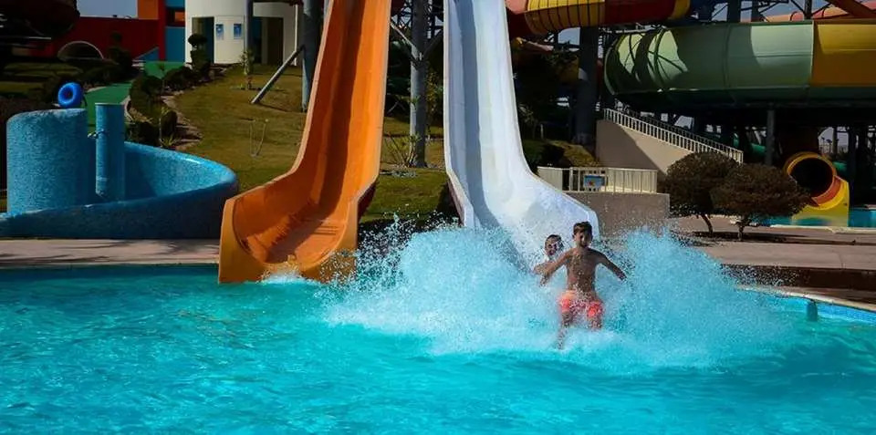 Choose your arrival style
Select the entry-only option if you will arrive independently, shared transfer if you want arranged group transport, or VIP private transfer for a private pickup and drop-off experience.
Pickup or direct arrival
Guests with transfer are picked up from the confirmed location according to the final pickup details. Entry-only guests arrive at Makadi Water World by themselves.
Entry and confirmation
Show your booking confirmation when required and enter the water park according to the selected option and valid ticket conditions.
Enjoy Makadi Water World
Spend time enjoying the water park atmosphere, pools, slides, splash areas, and relaxed holiday setting at your own pace.
Drinks and snacks
Use the drinks and snacks included in your selected package during the visit, following the venue’s rules and service conditions.
Free time at the park
Take breaks, relax, and continue enjoying the park until the arranged end time or until you are ready to leave under your option conditions.
Return arrangement
Entry-only guests leave independently. Shared-transfer guests return according to the shared transfer schedule. VIP private-transfer guests return with the private transfer arrangement.