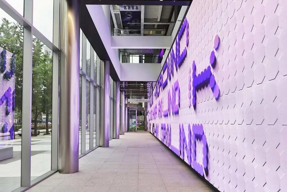 Walk through stunning, futuristic media walls showcasing the vibrant energy of K-Wave.