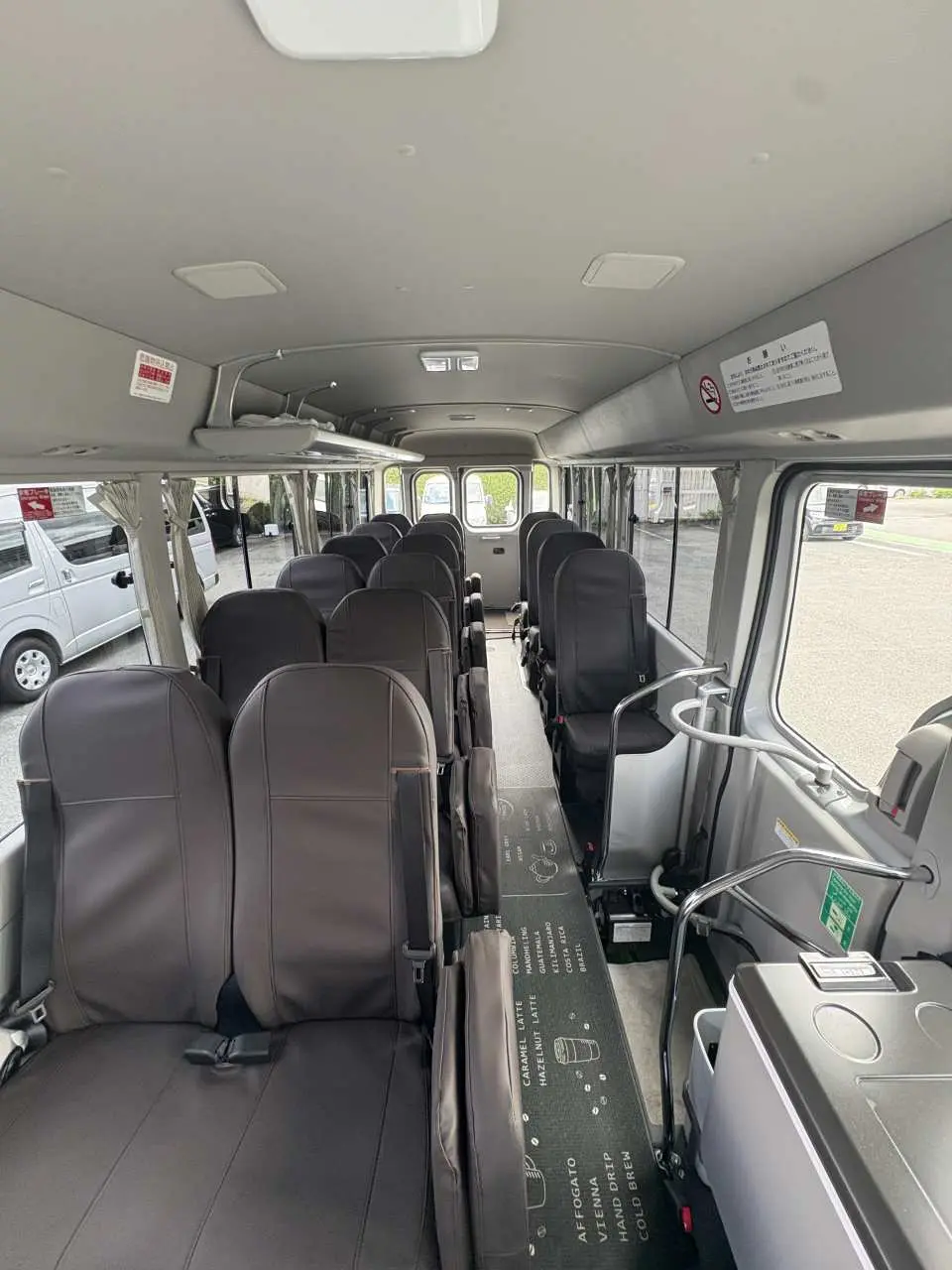 18-seat Toyota Coaster interior seating