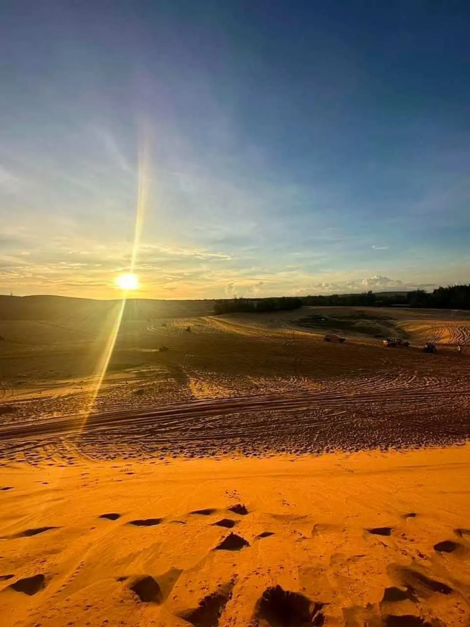 Red Sand Dunes (Sunset View)

Marvel at the fiery red sands as the sun sets over the dunes.

Enjoy the breathtaking scenery, perfect for photography.

Feel like you're in a desert, steps away from the beach!