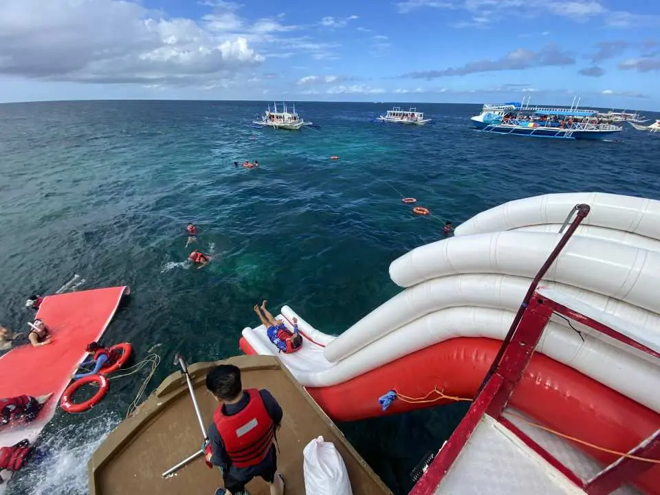 The "Big Splash": It offers an adrenaline-pumping way to enter the ocean compared to a standard ladder. slide direct to the water