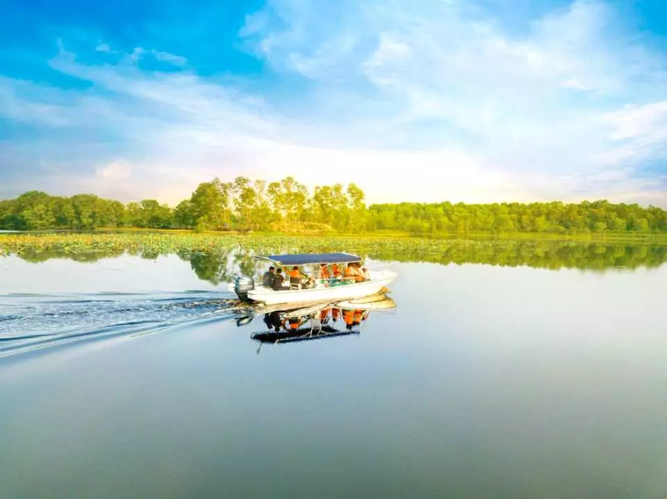 Take a leisurely cruise tour across the lake in an open boat at Paya Indah Discovery Wetlands