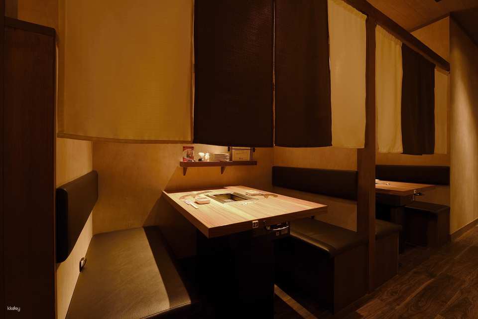 Dine peacefully in a modern Japanese semi-private area with enough space between you and the next the customer